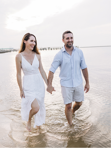 Family walking on beach
